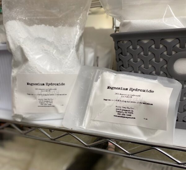 packages of various sizes of magnesium hydroxide