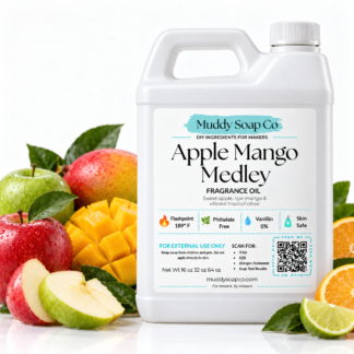 Apple Mango Medley fragrance oil in a white F-style jug with a white lid, surrounded by apples, mango and citrus slices.